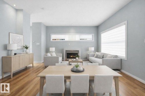 4 14315 Stony Plain Road, Edmonton, AB - Indoor Photo Showing Other Room With Fireplace