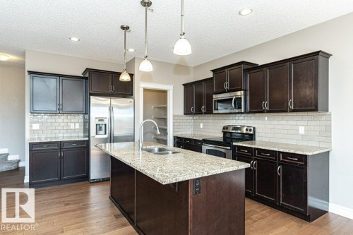 1920 33B Street, Edmonton, AB - Indoor Photo Showing Kitchen With Stainless Steel Kitchen With Double Sink With Upgraded Kitchen