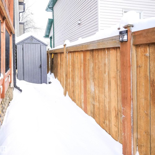 View of yard with a storage unit - 5836 204 Street, Edmonton, AB - Outdoor With Exterior