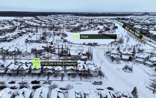 Snowy aerial view featuring a residential view - 5836 204 Street, Edmonton, AB - Outdoor With View