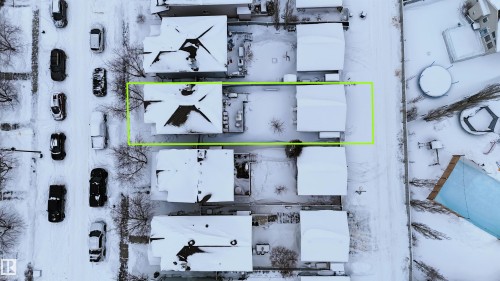 Aerial view of property and surrounding area with property boundaries highlighted - 5836 204 Street, Edmonton, AB - 