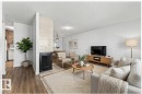 135 Surrey Gardens, Edmonton, AB  - Indoor Photo Showing Living Room With Fireplace 