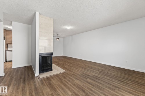 135 Surrey Gardens, Edmonton, AB - Indoor With Fireplace