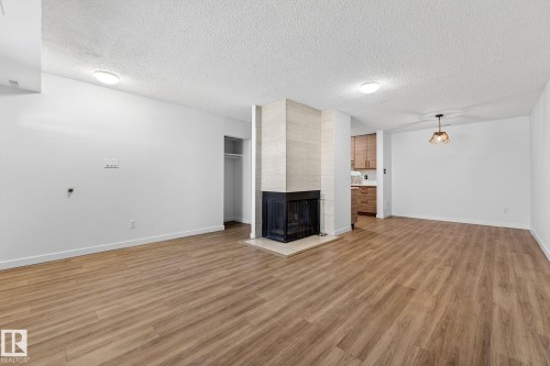 135 Surrey Gardens, Edmonton, AB - Indoor With Fireplace