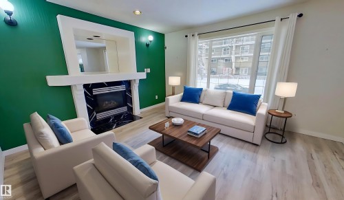 9331 103 Avenue, Edmonton, AB - Indoor Photo Showing Living Room With Fireplace
