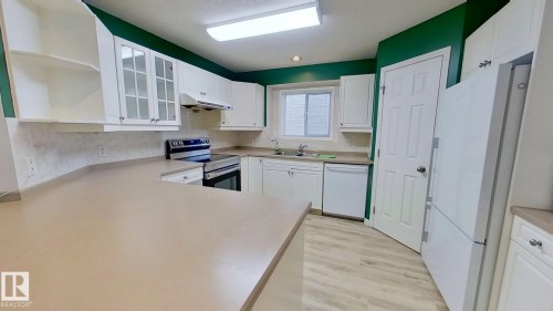 9331 103 Avenue, Edmonton, AB - Indoor Photo Showing Kitchen With Double Sink