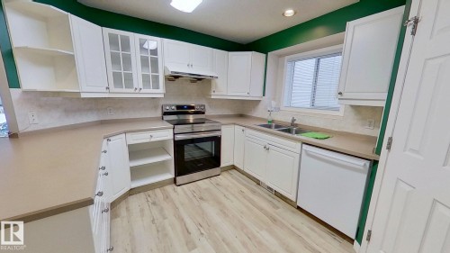 9331 103 Avenue, Edmonton, AB - Indoor Photo Showing Kitchen With Double Sink