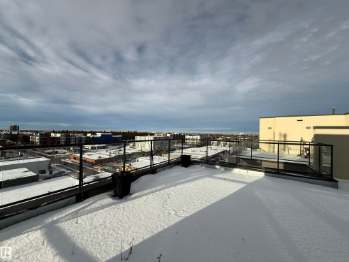 Private rooftop patio accessible directly from the unit. - 611 11425 105 Avenue, Edmonton, AB - Outdoor With View