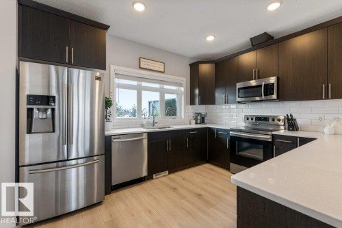 69 Joyal Way, St. Albert, AB - Indoor Photo Showing Kitchen With Stainless Steel Kitchen With Double Sink With Upgraded Kitchen
