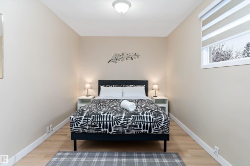 Bedroom featuring light wood-type flooring - 17107 86 Avenue Nw, Edmonton, AB - Indoor Photo Showing Bedroom