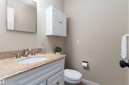 Bathroom with vanity and toilet - 17107 86 Avenue Nw, Edmonton, AB - Indoor Photo Showing Bathroom