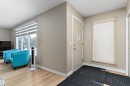 Foyer entrance featuring baseboards and light wood-style floors - 17107 86 Avenue Nw, Edmonton, AB  - Indoor Photo Showing Other Room 