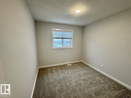 126 Stiles Bend, Leduc, AB - Indoor Photo Showing Other Room
