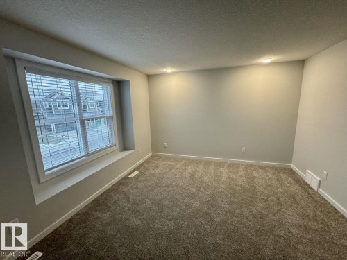 126 Stiles Bend, Leduc, AB - Indoor Photo Showing Other Room