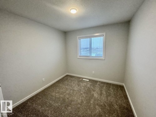126 Stiles Bend, Leduc, AB - Indoor Photo Showing Other Room