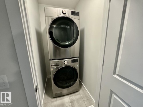 126 Stiles Bend, Leduc, AB - Indoor Photo Showing Laundry Room