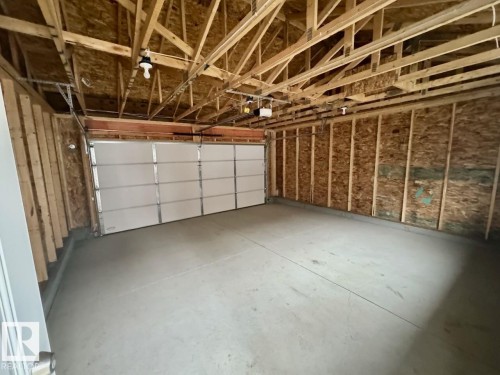 126 Stiles Bend, Leduc, AB - Indoor Photo Showing Garage