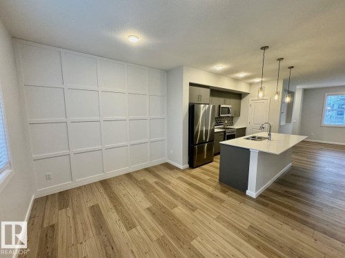 126 Stiles Bend, Leduc, AB - Indoor Photo Showing Kitchen With Double Sink