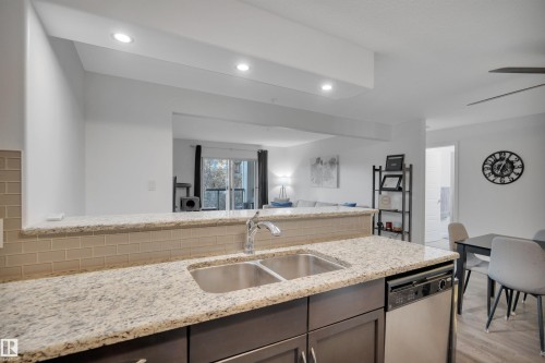 264 11517 Ellerslie Road, Edmonton, AB - Indoor Photo Showing Kitchen With Double Sink