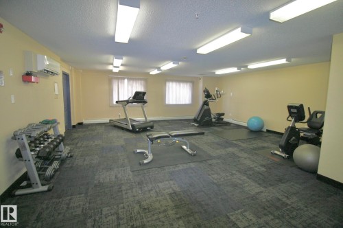 312 155 Edwards Drive, Edmonton, AB - Indoor Photo Showing Gym Room