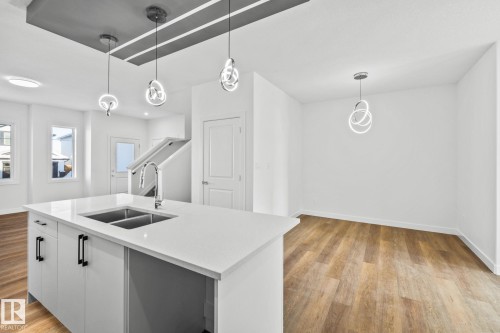 65 Ficus Way, Fort Saskatchewan, AB - Indoor Photo Showing Kitchen With Double Sink