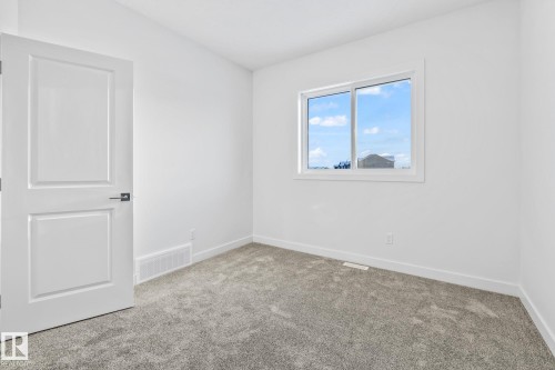 65 Ficus Way, Fort Saskatchewan, AB - Indoor Photo Showing Other Room