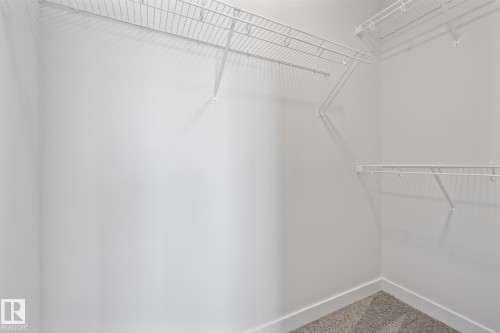 View of spacious closet - 206 Starling, Fort Saskatchewan, AB - Indoor With Storage