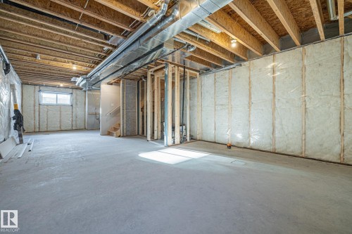 Below grade area with stairs - 206 Starling, Fort Saskatchewan, AB - Indoor Photo Showing Basement