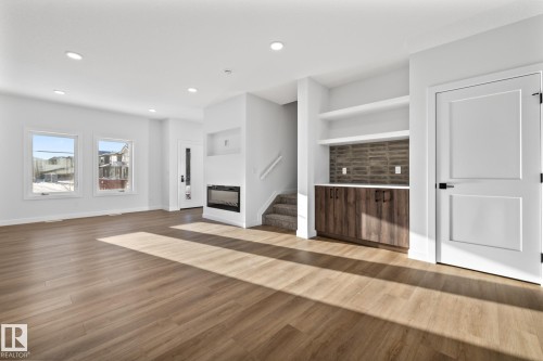 206 Starling, Fort Saskatchewan, AB - Indoor Photo Showing Living Room With Fireplace
