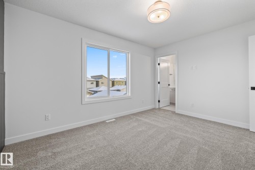 206 Starling, Fort Saskatchewan, AB - Indoor Photo Showing Other Room