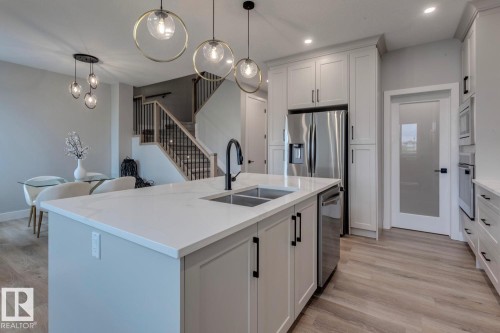 3612 Triomphe Boulevard, Beaumont, AB - Indoor Photo Showing Kitchen With Double Sink With Upgraded Kitchen
