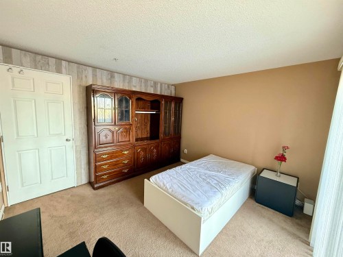 210 245 Edwards Drive, Edmonton, AB - Indoor Photo Showing Bedroom