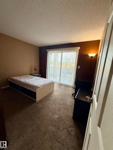 210 245 Edwards Drive, Edmonton, AB - Indoor Photo Showing Bedroom