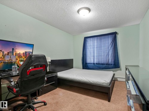 210 245 Edwards Drive, Edmonton, AB - Indoor Photo Showing Bedroom