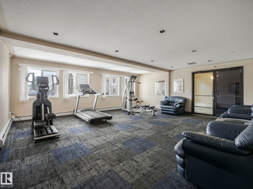 210 245 Edwards Drive, Edmonton, AB - Indoor Photo Showing Gym Room