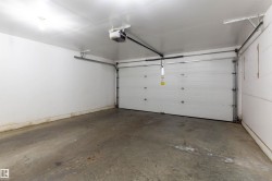 Garage featuring a garage door opener - 