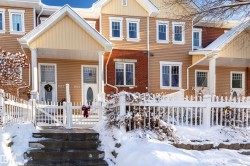 Traditional home featuring covered porch and board and batten siding - 