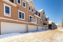 View of building exterior featuring a residential view - 