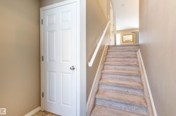 Staircase featuring baseboards - 