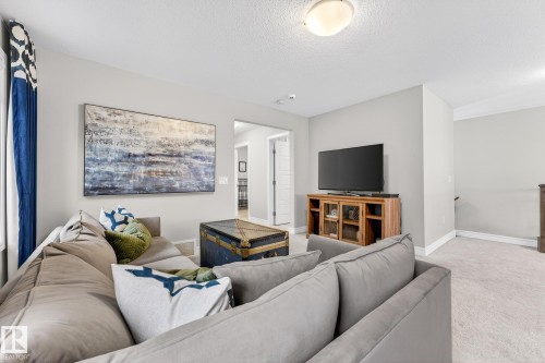 1212 Cy Becker Road, Edmonton, AB - Indoor Photo Showing Living Room