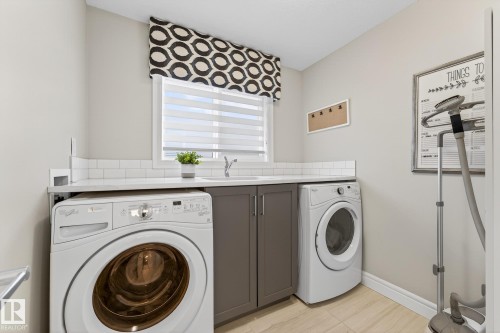 1212 Cy Becker Road, Edmonton, AB - Indoor Photo Showing Laundry Room