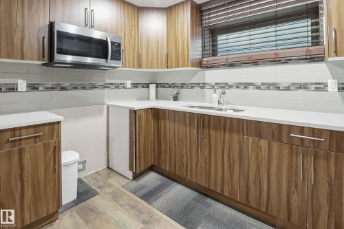 1404 29 Street, Edmonton, AB - Indoor Photo Showing Kitchen With Double Sink
