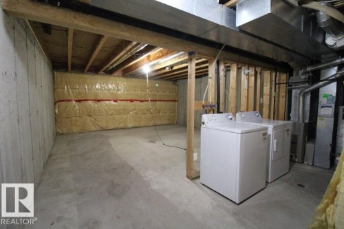 7 451 Hyndman Crescent, Edmonton, AB - Indoor Photo Showing Laundry Room