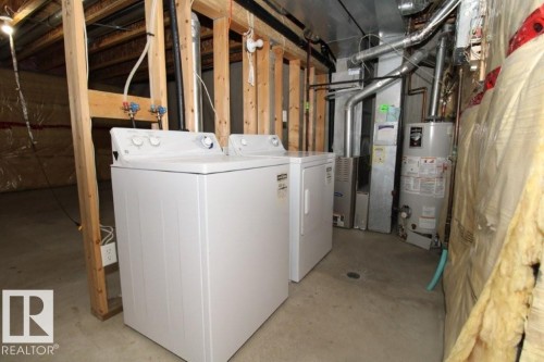 7 451 Hyndman Crescent, Edmonton, AB - Indoor Photo Showing Laundry Room