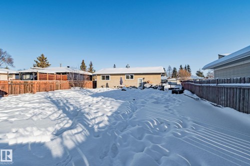 Yard covered in snow featuring a fenced backyard - 21 Lundy Park Road, Stony Plain, AB - Outdoor