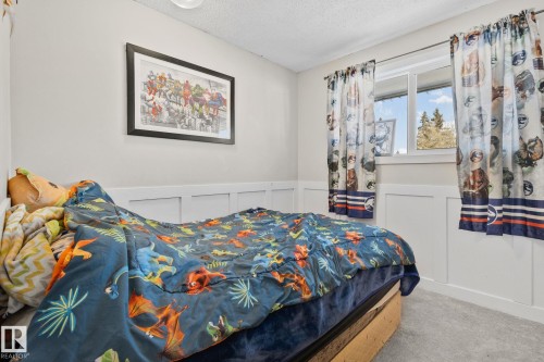 21 Lundy Park Road, Stony Plain, AB - Indoor Photo Showing Bedroom