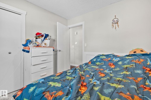 21 Lundy Park Road, Stony Plain, AB - Indoor Photo Showing Bedroom