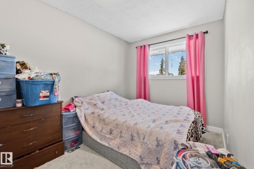 21 Lundy Park Road, Stony Plain, AB - Indoor Photo Showing Bedroom