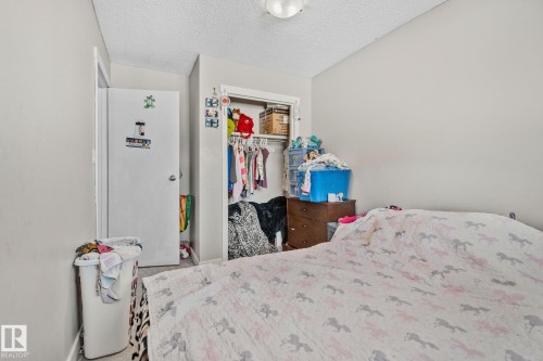 21 Lundy Park Road, Stony Plain, AB - Indoor Photo Showing Bedroom
