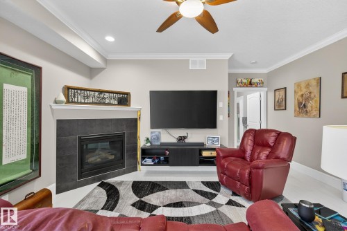 63 7293 South Terwillegar Drive, Edmonton, AB - Indoor Photo Showing Living Room With Fireplace